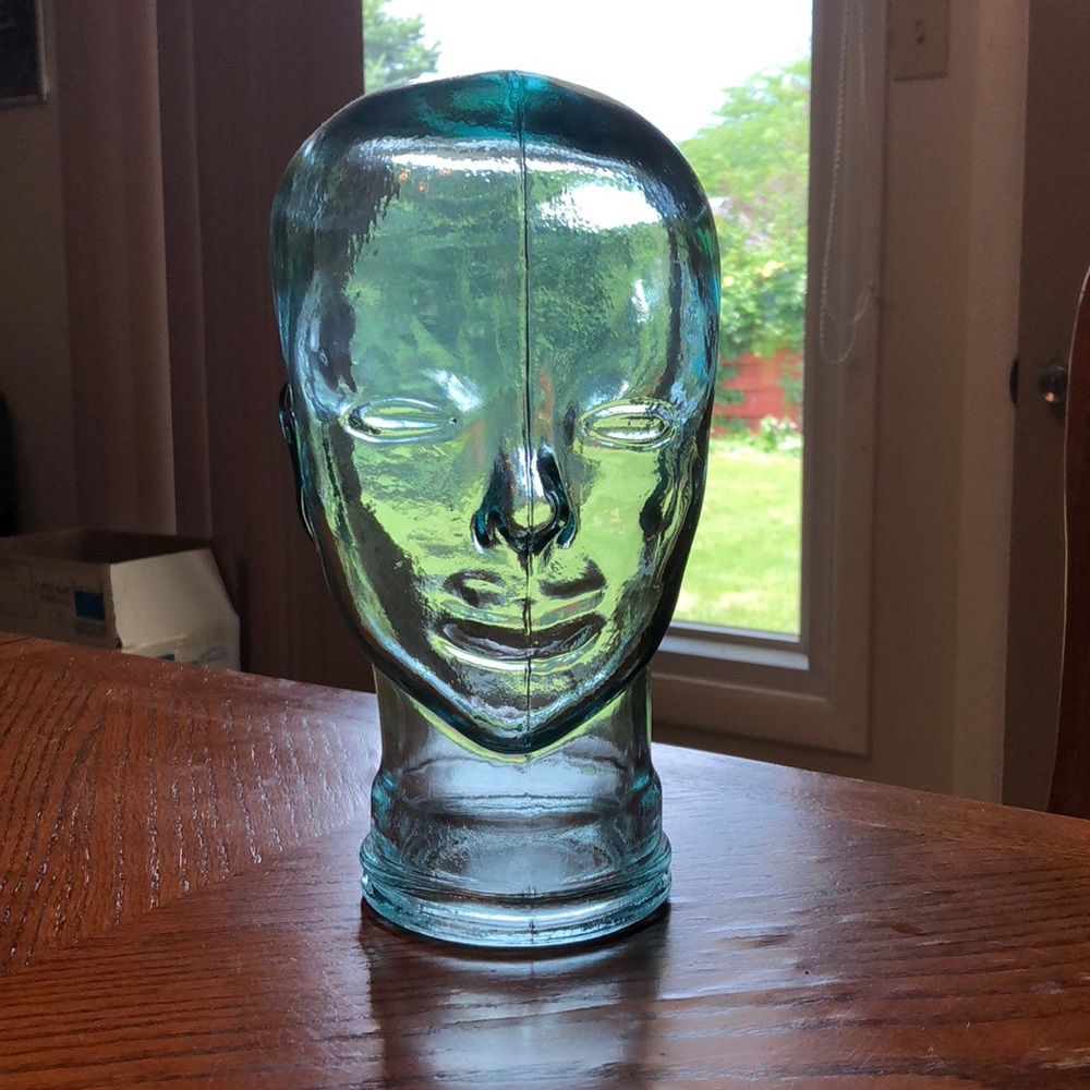 Glass head display (white hat not included)